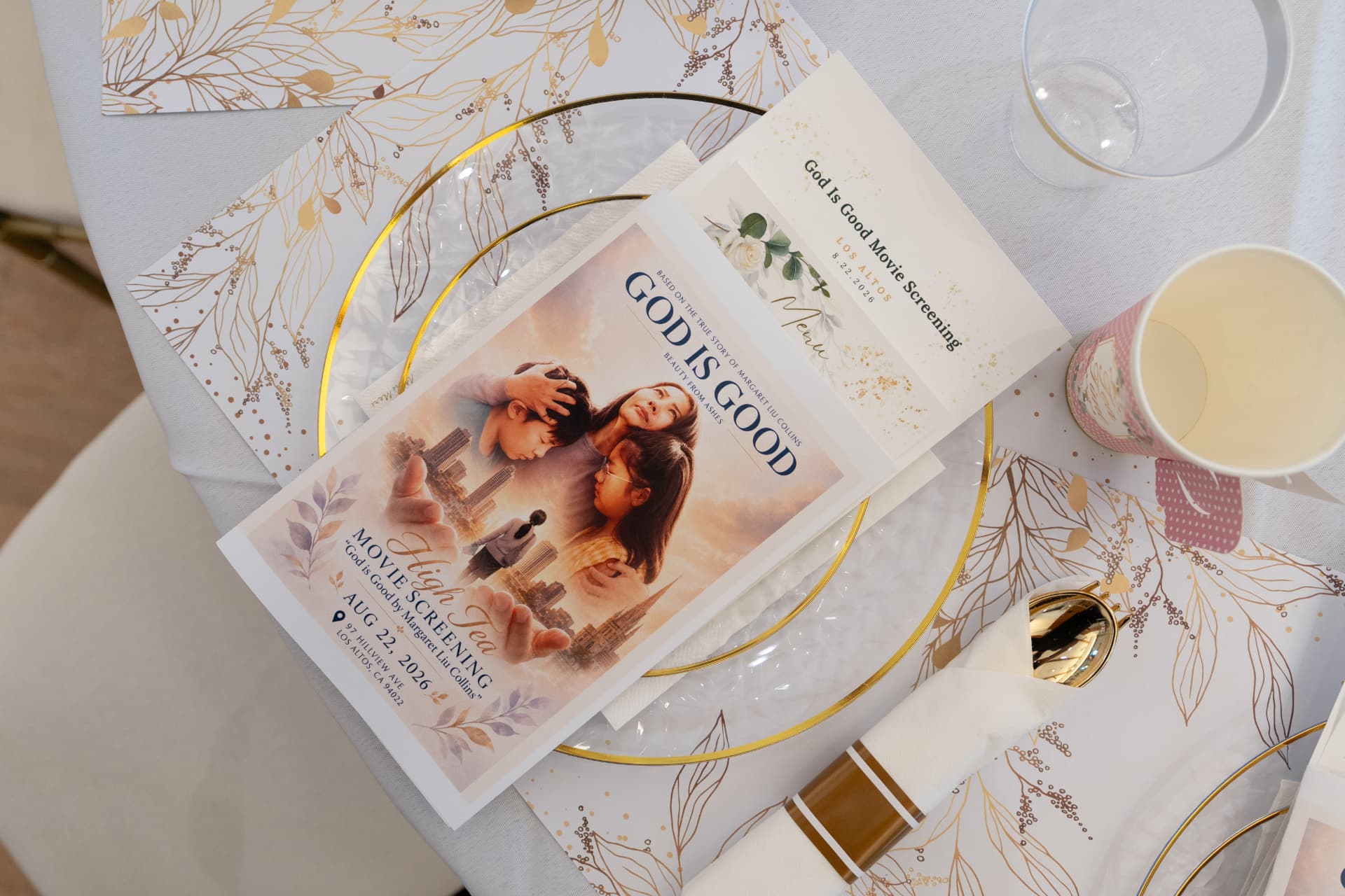 God Is Good program and high tea menu at a place setting